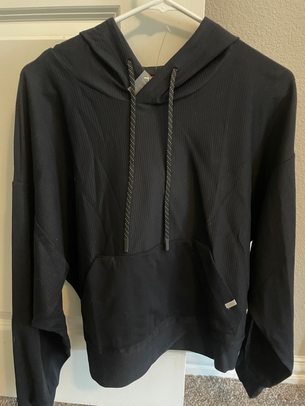 Rhône Black Ribbed Hoodie with Drawstring